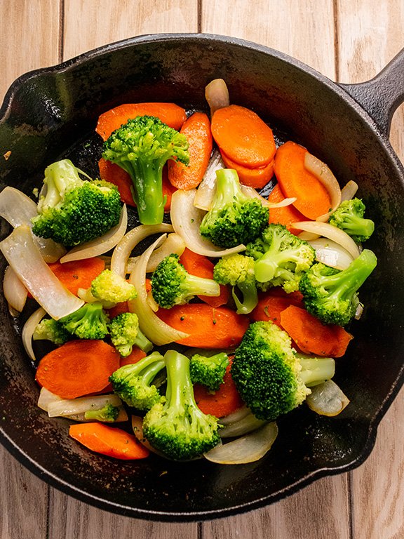 Image of Make Vegetables: clean skillet and return to stove. Heat oil...