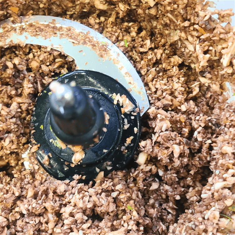 Image of While they are cooking, pulse the mushrooms in the food...