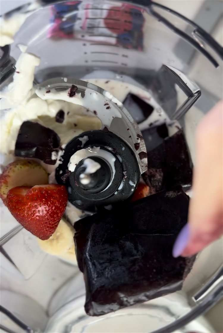 Image of Once froze, add milk, yogurt and frozen fruit to blender...
