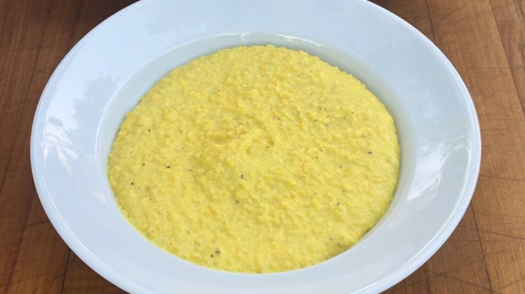 Image of Cover with a lid and keep on very low heat until ready to plate. If they become too dense, add a little water and stir. They should have the following consistency: