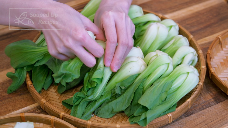 Image of Whenever you buy a big bag of bok choy, and you are not planning to eat them all in one day, you can tear the outer leaves from each bok choy and cook them first. The center core can stay...
