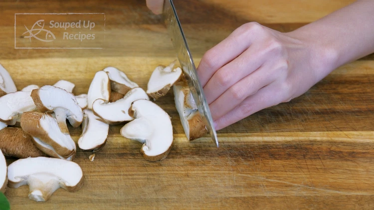 Image of Cut the mushrooms into 1/4-inch think pieces. I am using shiitake, but oyster mushroom and chanterelle are also good choices.