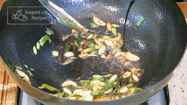 Image of Add 1.5 Tbsps of oyster sauce, 2 tsps of soy sauce, and 1 tsp of dark soy sauce and stir well. This is a classic scallion sauce that can go with almost any vegetable. It gives the food a savory...