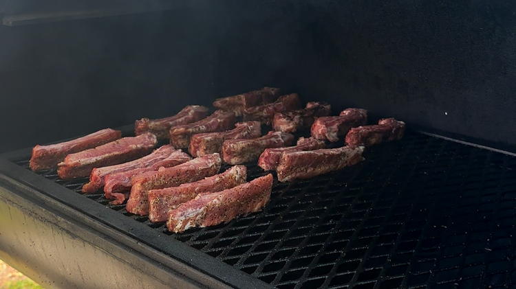 Image of Once the spice has tacked up (the ribs should look like they have wetted through the spices), cut them into single bones by slicing between the bones, keeping close to one side… I got so excited while making these ribs...