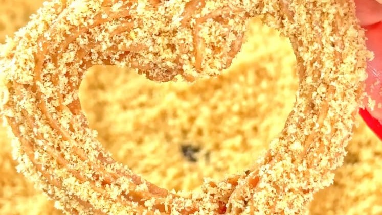 Close up of a CauliPuffs heart shaped churro