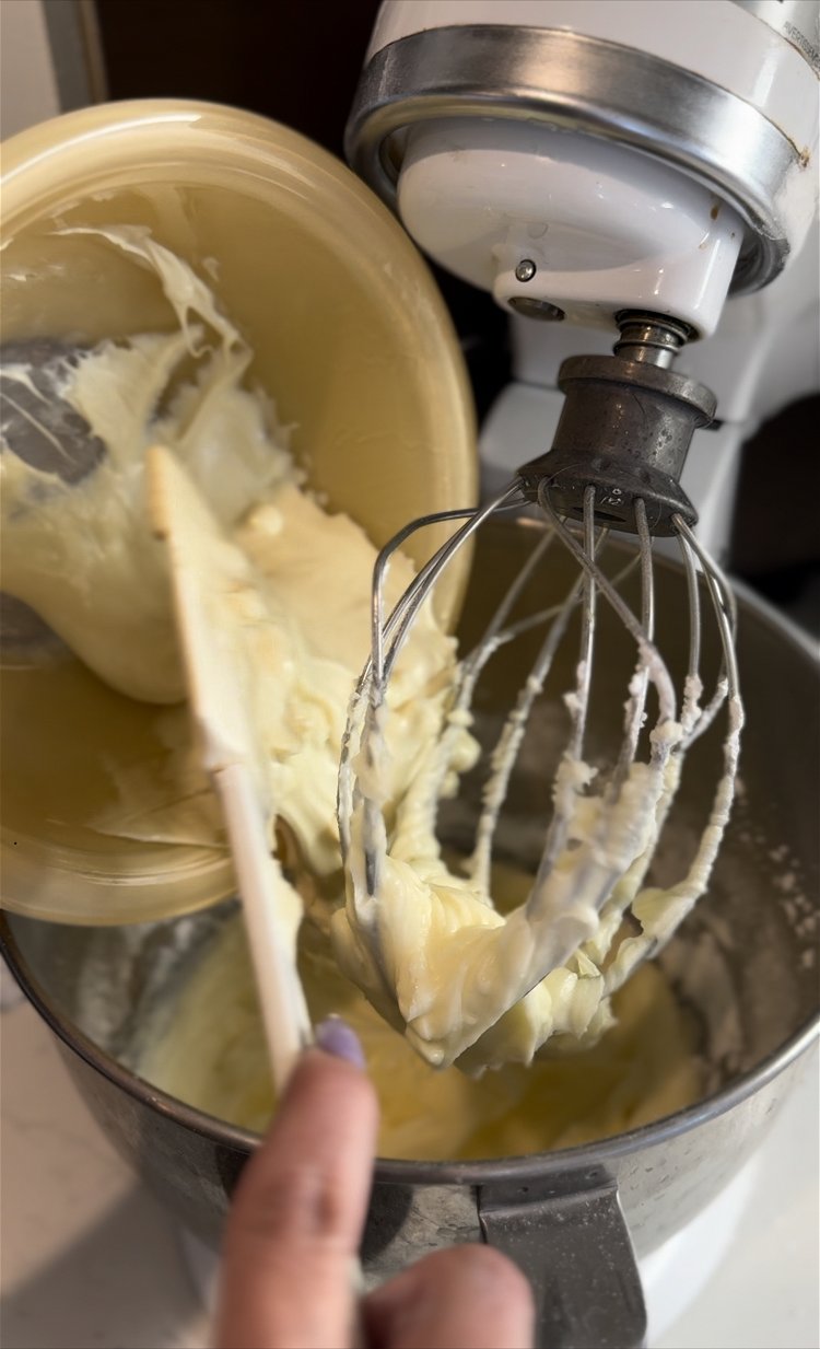 Image of Add the melted white chocolate until combined.