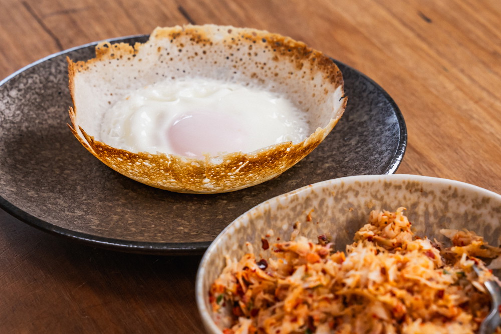 Egg hoppers with coconut sambol