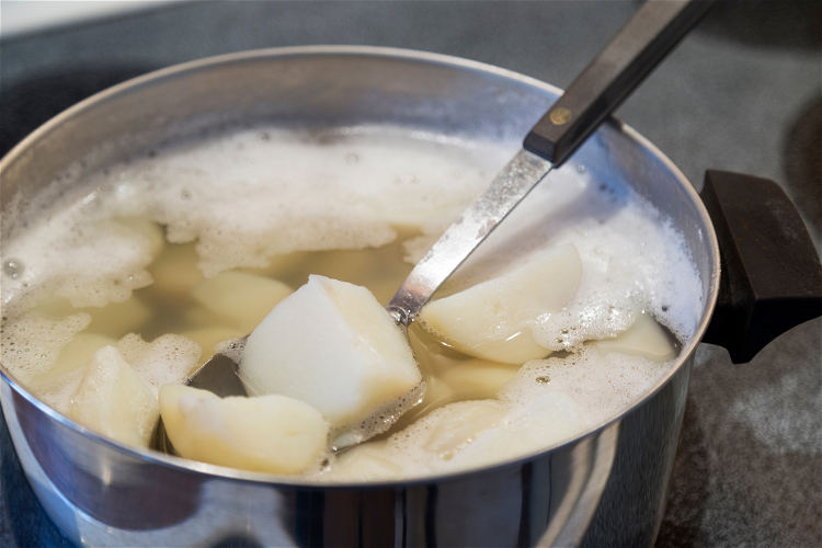 Image of Place the potato chunks in a large pot and cover...