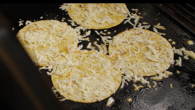 Image of Before flipping the tortillas, spray them with duck fat. Flip,...