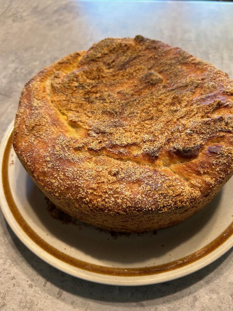 Image of Bake the bread for 45 minutes with the lid on (Be sure your lid is oven-proof). Remove the lid and bake for an additional 5 to 10 minutes until the top of the loaf is golden brown with deeper brown...