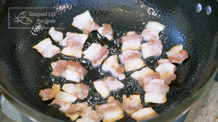 Image of Add the pork belly slices into the wok and stir over medium-low heat for a few minutes or until you get about 2 tbsp of pork fat. You can also use bacon but you have to adjust the seasoning amount...