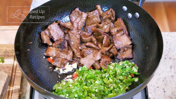 Image of Add the roast chili pepper and mix with the beef thoroughly.