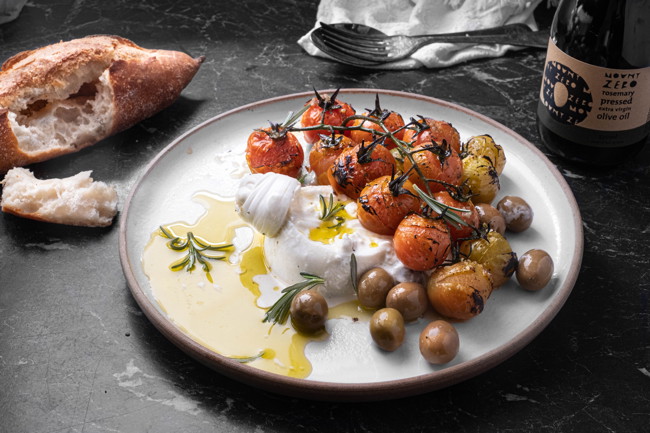 Image of grilled tomatoes with burrata, olives, rosemary & olive oil