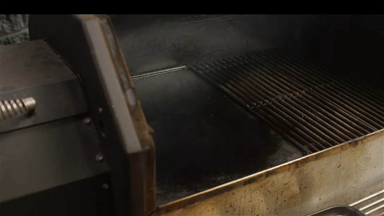 Image of Turn the grill temperature down to 350ºF. Clean the griddle...