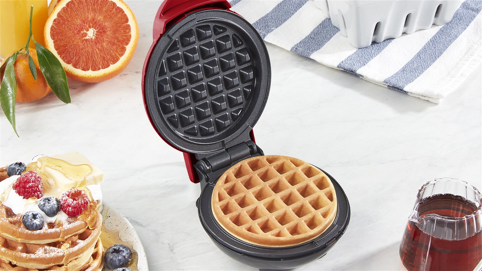 Plate of 3 waffles with a Rise by Dash Mini Waffle Maker