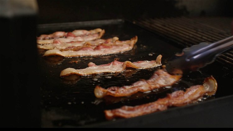 Image of Cook the bacon on the griddle until browned but not...