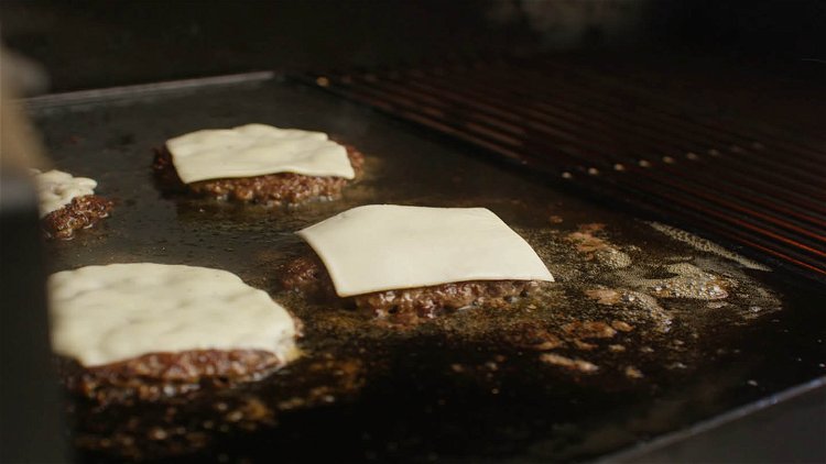Image of When the patties are well seared and browned, flip, then...