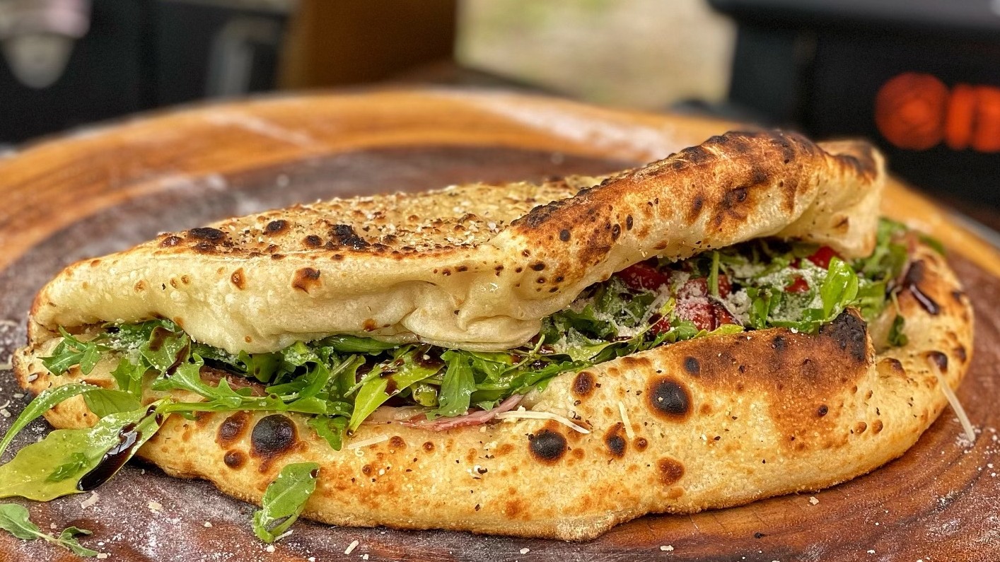 Image of Arugula and Coppa Pizza Sandwich