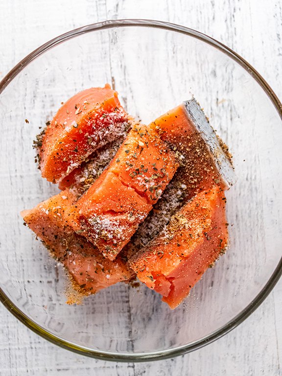 Image of Blot salmon with paper towel and place in a bowl....