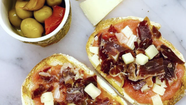 Image of Jamón Ibérico & Manchego Cheese cubes on toast