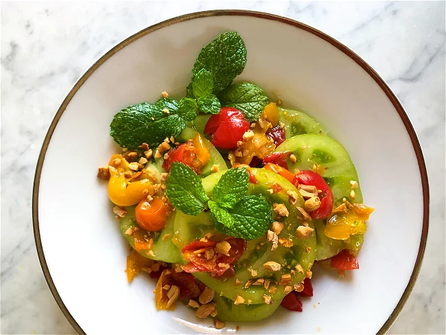 Image of Green Tomatoes Salad with Mam Nem