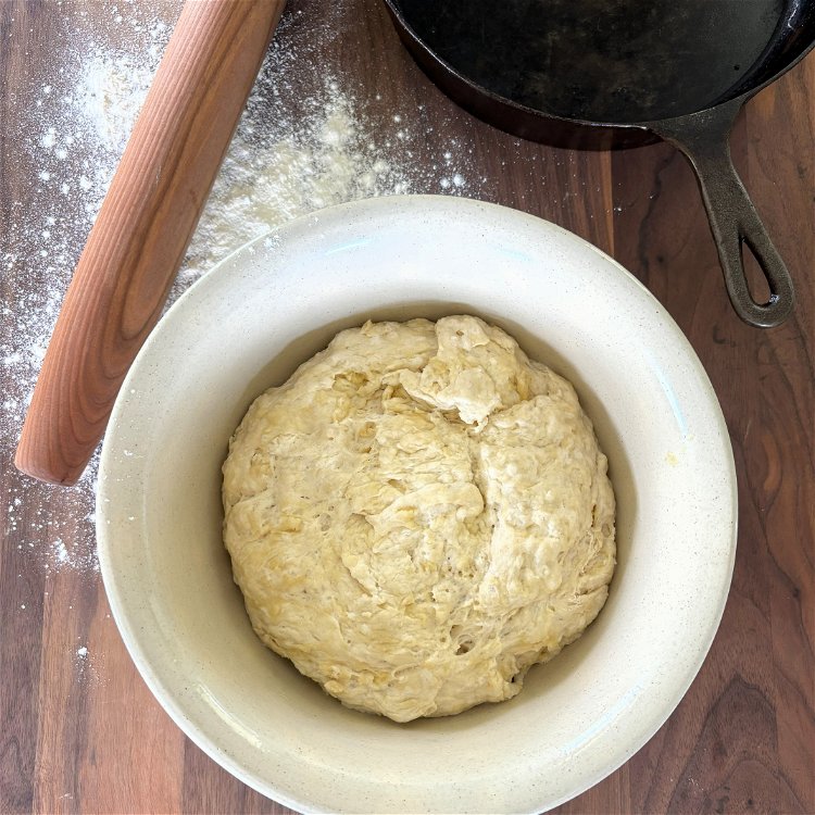 Image of Turn dough out onto the counter and continue working the...