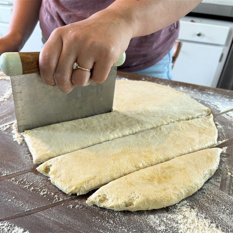 Image of Punch dough down and turn it out onto the counter....