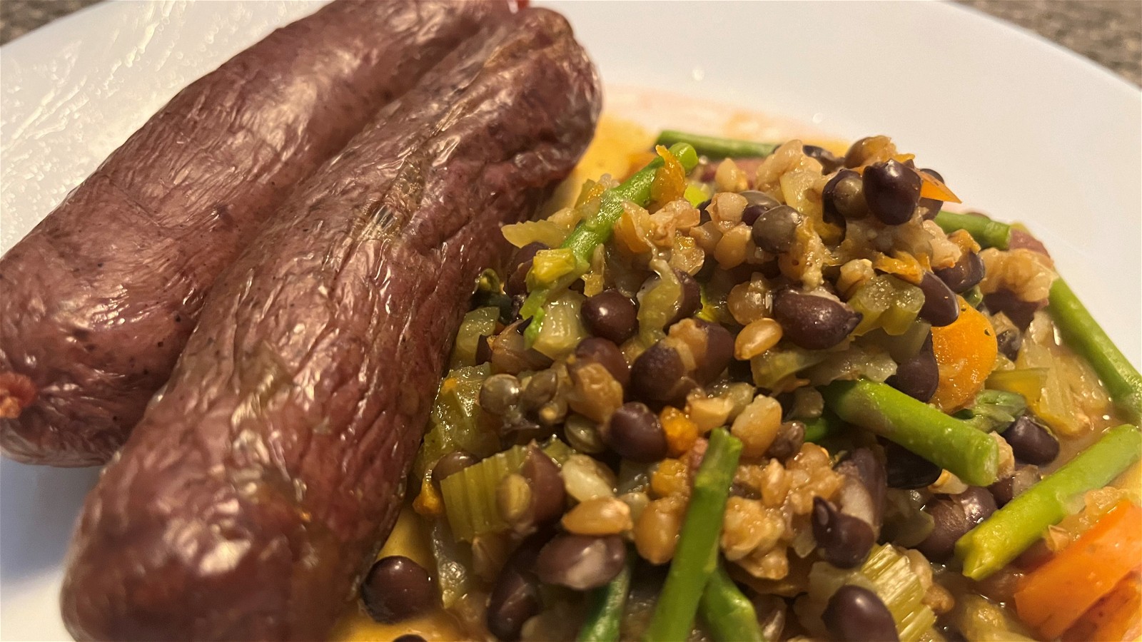 Image of Bangers And Beans with Greens