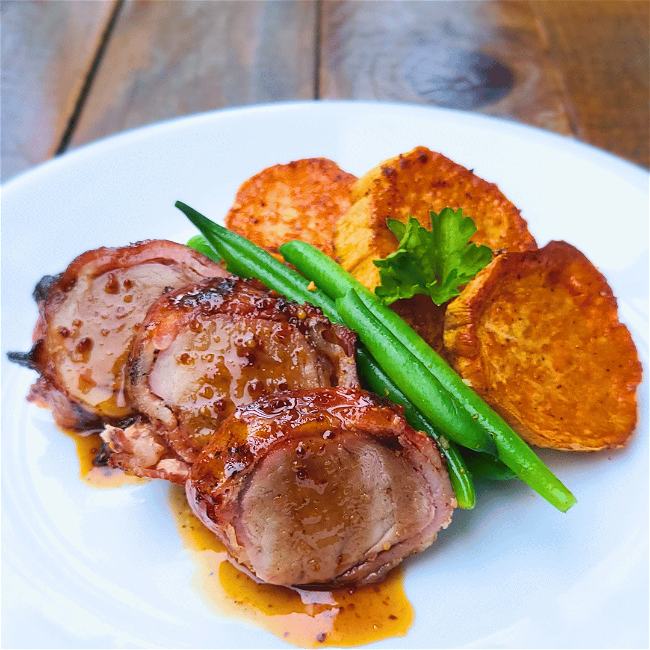 Image of  Grilled Bacon-Wrapped Boar Tenderloin with Brown Sugar Bourbon Glaze