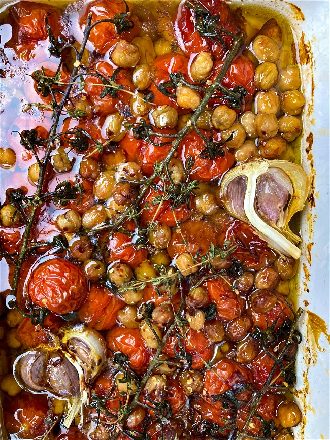 Image of Confit Tomatoes + Chickpeas with Whipped Feta Crostinis