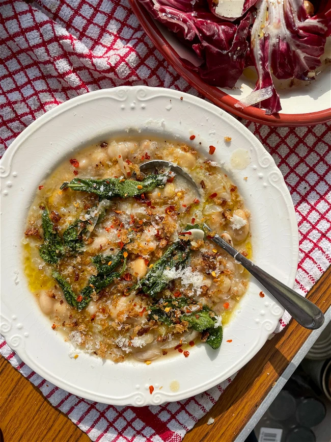 Image of White Bean Stew with Parmigiano, Pangrattato + Crispy Sage