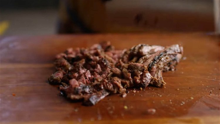 Image of Chop the steak into small pieces.