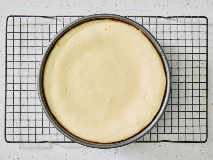 Image of Place the cheesecake in the preheated oven and bake until...
