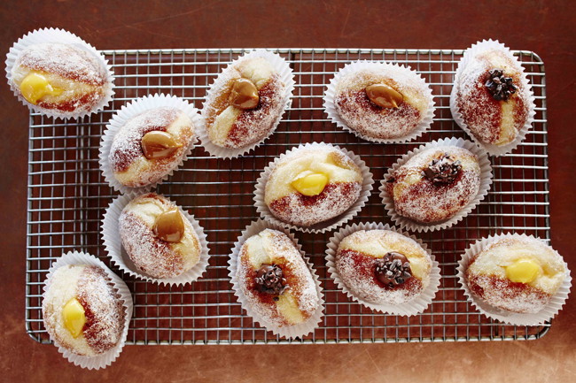 Image of vanilla cream doughnuts with lemon pressed extra virgin olive oil