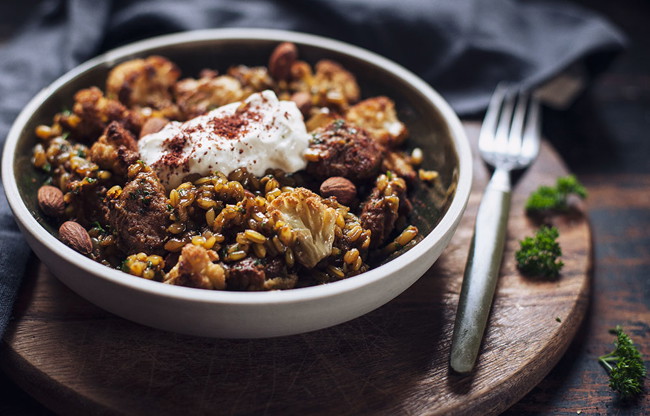 Image of roast cauliflower & pork sausage freekeh pilaf