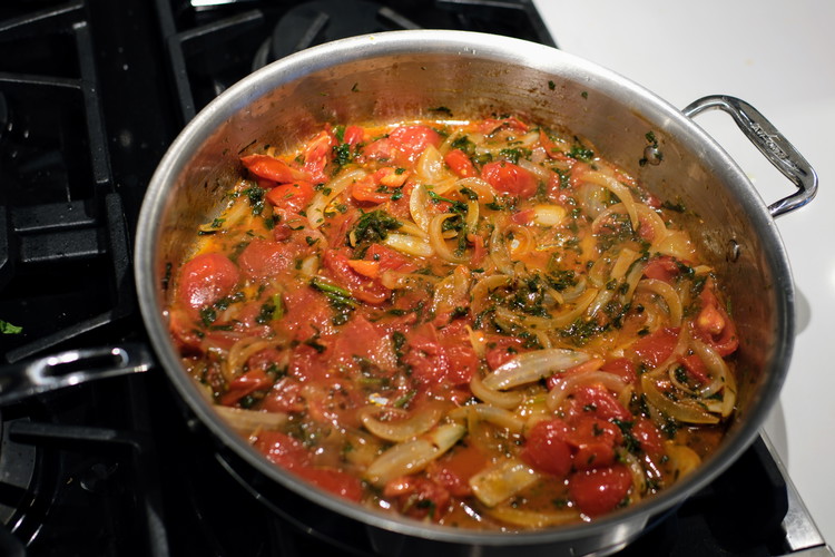 Image of Add salt, tomato paste, and paprika to pan and stir.  Allow tomatoes to soften and cook about 5 minutes.