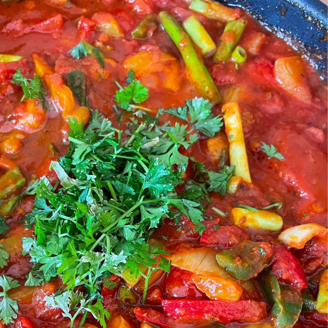 Taktouka (Moroccan cooked peppers and tomato salad) with Parsley-Persian Lime Drizzle