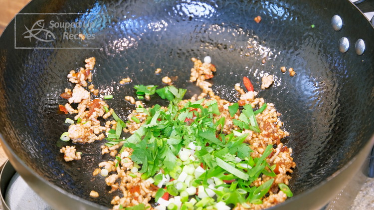 Image of Add 1/2 tbsp of Sichuan doubanjiang and stir well. Toss in some minced garlic, diced thai bird eye chilies, scallion, and cilantro. Stir until fragrant. If you don’t eat spicy food, you can replace the Sichuan doubanjiang with soybean paste and switch the...