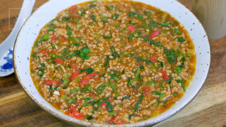 Image of By now, the tofu and egg should be done steaming. Take it out of the steamer. Pour the pork gravy onto the steamed egg and tofu. Enjoy!
