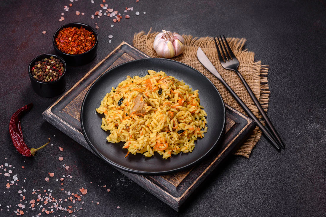 Arroz con pollo y verduras en olla rápida