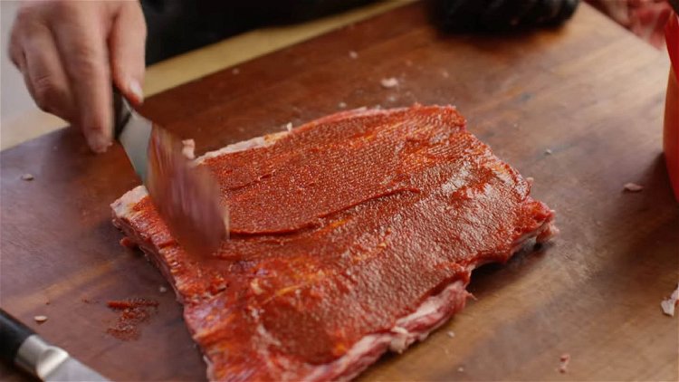 Image of Slather the ribeye cap with the gochujang.