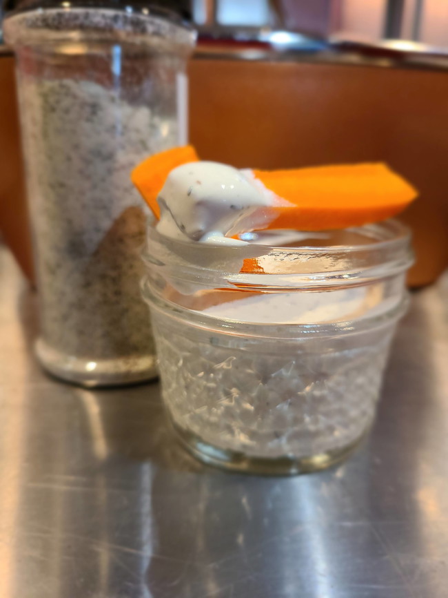 Jar of ranch dressing with a carrot