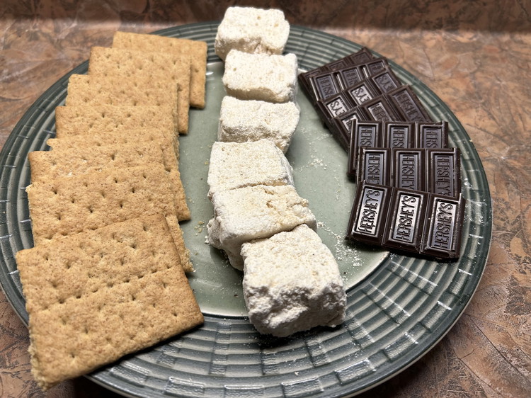 Image of When the marshmallow has cooled and set, cut it into squares and dredge the edges of each square in the remaining sugar mixture to coat. Yield: 2 dozen 1 ½”  marshmallows