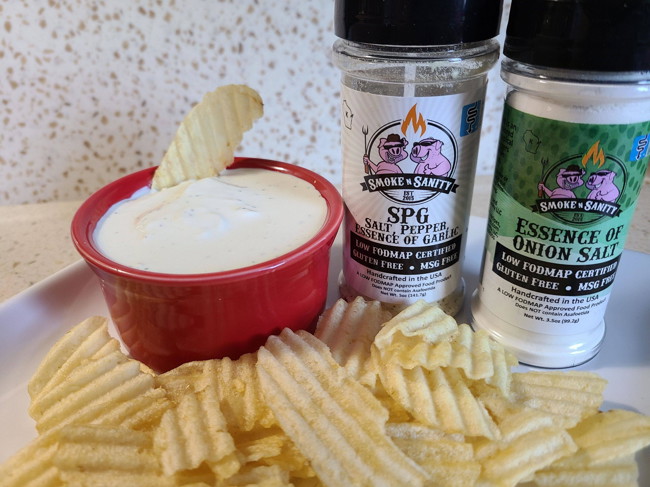 Dish of faux onion chip dip with potato chips