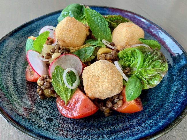 Image of heirloom tomato & celery salad with green lentils & crispy kashkaval cheese