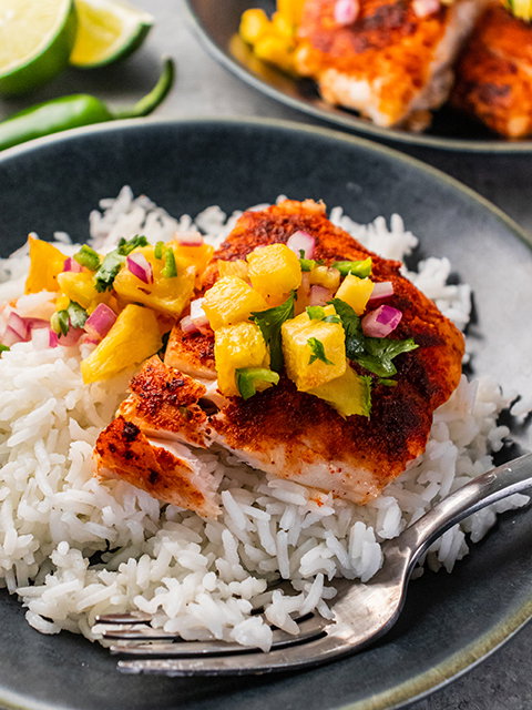 Image of Serve warm topped with pineapple jalapeño salsa. 