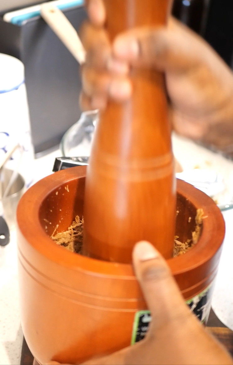 Image of Once the tender beef has completely cooled down. Turn the beef into fine shreds by pounding away with a mortar and pestle.