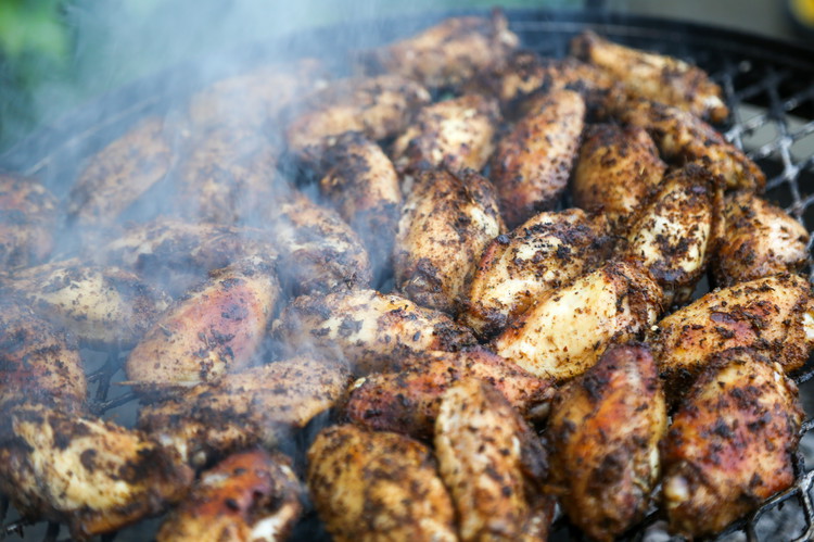 Image of Grill over low heat for 30-50 minutes turning often. Don’t let them burn, this takes active grilling so don’t walk away. Don’t worry about crowding, wings are fine hanging out with each other. So are you!Grab a red-stripe, lime, and...