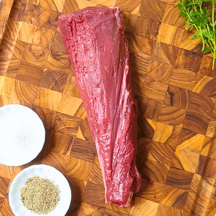 Image of Trim off any silverskin and pat the meat dry with a paper towel.