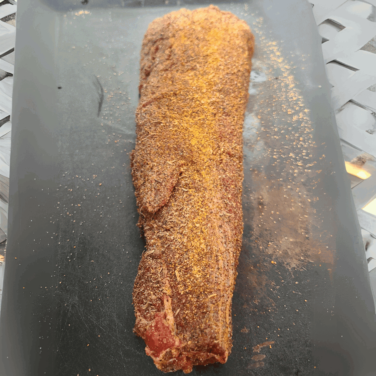 Image of Rub a generous amount of the spice mixture over the tenderloins. Allow the meat time to get to room temperature before you grill it. This will ensure a more even cook. 